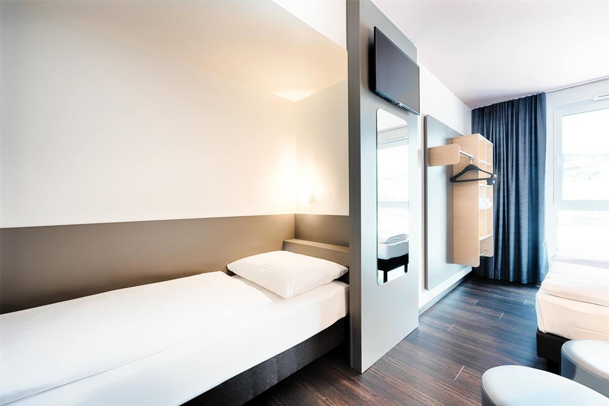 Quarto triplo | 1 quarto, Wi-Fi de cortesia, roupa de cama
