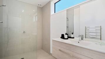 Bathtub, hair dryer, towels
