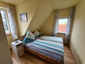 2 bedrooms, desk, iron/ironing board, travel crib