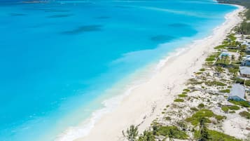 On the beach, sun-loungers, beach towels