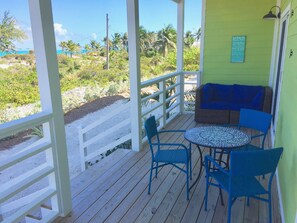 Outdoor dining - Colorful Beach Home w/ Ocean Front View + 2 Master Bedrooms (Exuma)