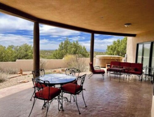 Large private, high end home with sweeping views on 13 acres.