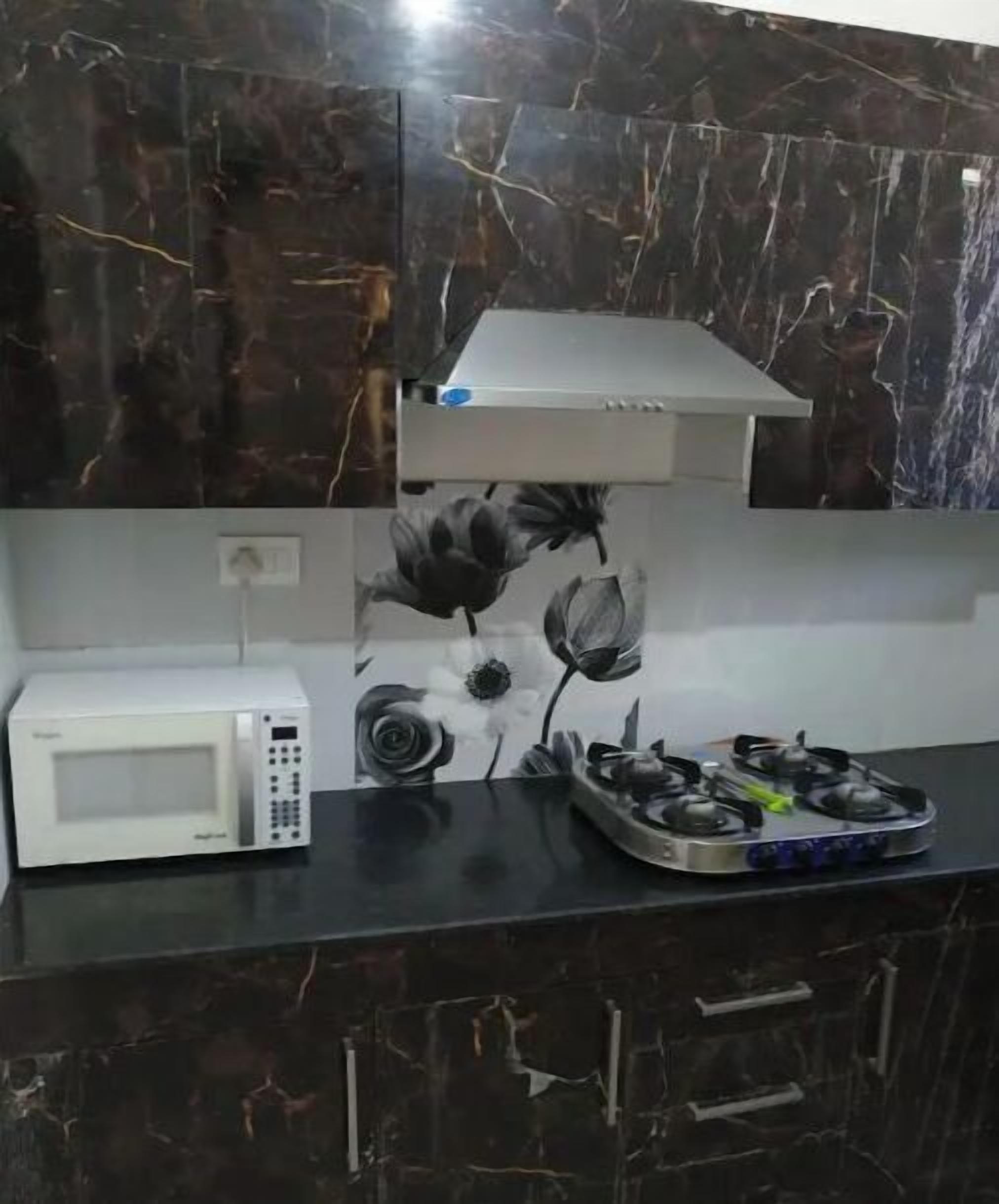 Fridge, cookware/dishes/utensils, dining tables