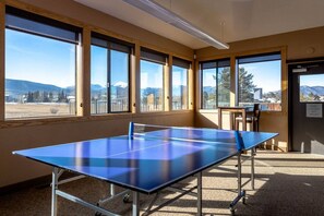 Enjoy a game of ping pong with a mountain view from the room's large windows.