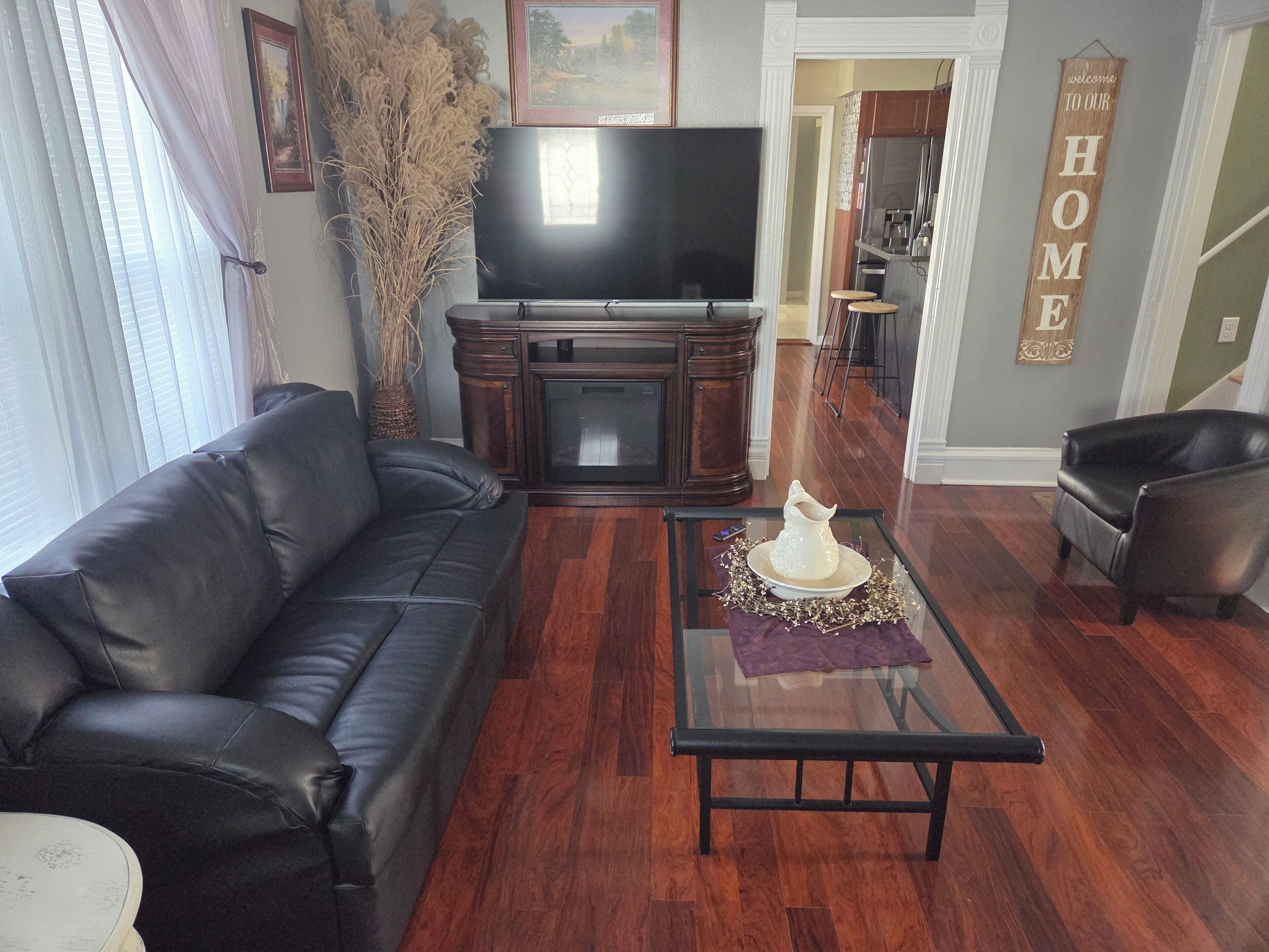 Smart TV, fireplace, books