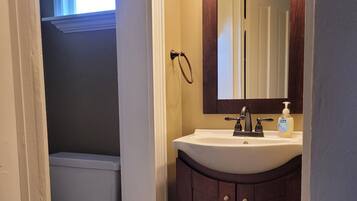 Combined shower/tub, hair dryer, towels, toilet paper