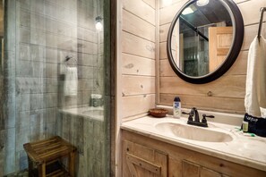 Combined shower/tub, hair dryer, towels, shampoo
