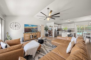 Smart TV, fireplace, books, printers