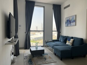 TV - Cozy Haven retreat resort lifestyle retreat in coveted Midtown Community
(Dubai)