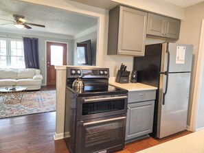 Fridge, microwave, oven, stovetop - Bright & Cozy CLE Spot  Near Stadiums & Downtown (Cleveland)