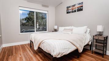 1 bedroom, desk, iron/ironing board, travel cot