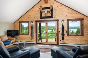 TV connectée, cheminée, lecteur de DVD, vidéothèque