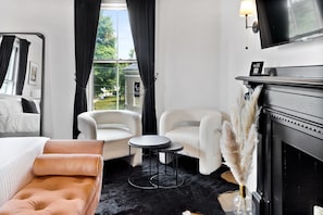 Suite, 1 King Bed | Living area | 15-inch Smart TV with digital channels - The Coach House (Salem)