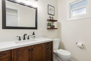 Bathtub, hair dryer, towels