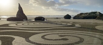 Charming dog-friendly home with ocean-view, beach access, & washer/dryer