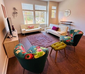 TV, fireplace - Modern LoSo Retreat|Walk to Breweries & Light Rail (Charlotte)