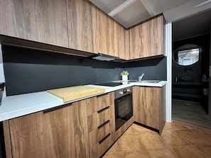Appartement, 1 chambre, balcon, vue sur la ville | Cuisine privée