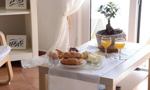 Apartment, 1 Schlafzimmer, Balkon, Stadtblick | Speisen