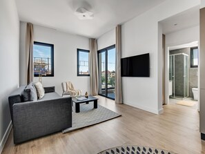 Apartamento, 1 quarto, sacada, vista para a cidade | Sala de estar