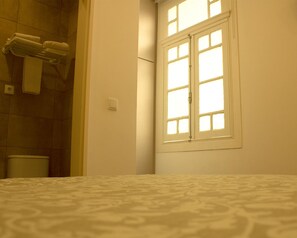 Basic Room, interior window | In-room safe, free WiFi, bed sheets