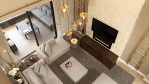 A modern living room with a fireplace, sofas, and a TV. - Disney Area! 4 B/R  Spacious Townhouse, Free Parking, Wi-Fi Shared Pool (Kissimmee)