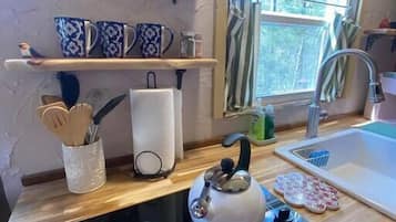 Fridge, microwave, stovetop, coffee/tea maker