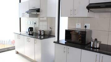 Mini-fridge, microwave, stovetop, toaster