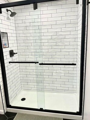 Shower, hair dryer, towels, soap - Boho 405 - DI Home Rentals (Stillwater)