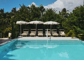 Outdoor pool, pool umbrellas, sun loungers