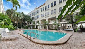 Outdoor pool, a heated pool - Island Newly Renovated 1 BR- King Bed (Palm Beach)