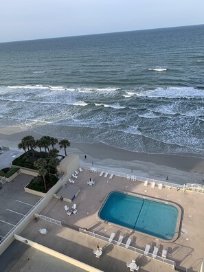 Outdoor pool, a heated pool - Oceanfront Condominium in quiet Daytona Beach Shores (Daytona Beach Shores)
