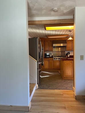 View from side entrance looking in at the kitchen 