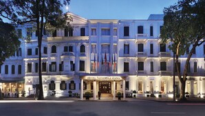 A historic hotel with a grand facade, multiple stories, and a prominent entrance. - If you Like it, Stay If you Dont Like it, Just Stay (Hanoi)
