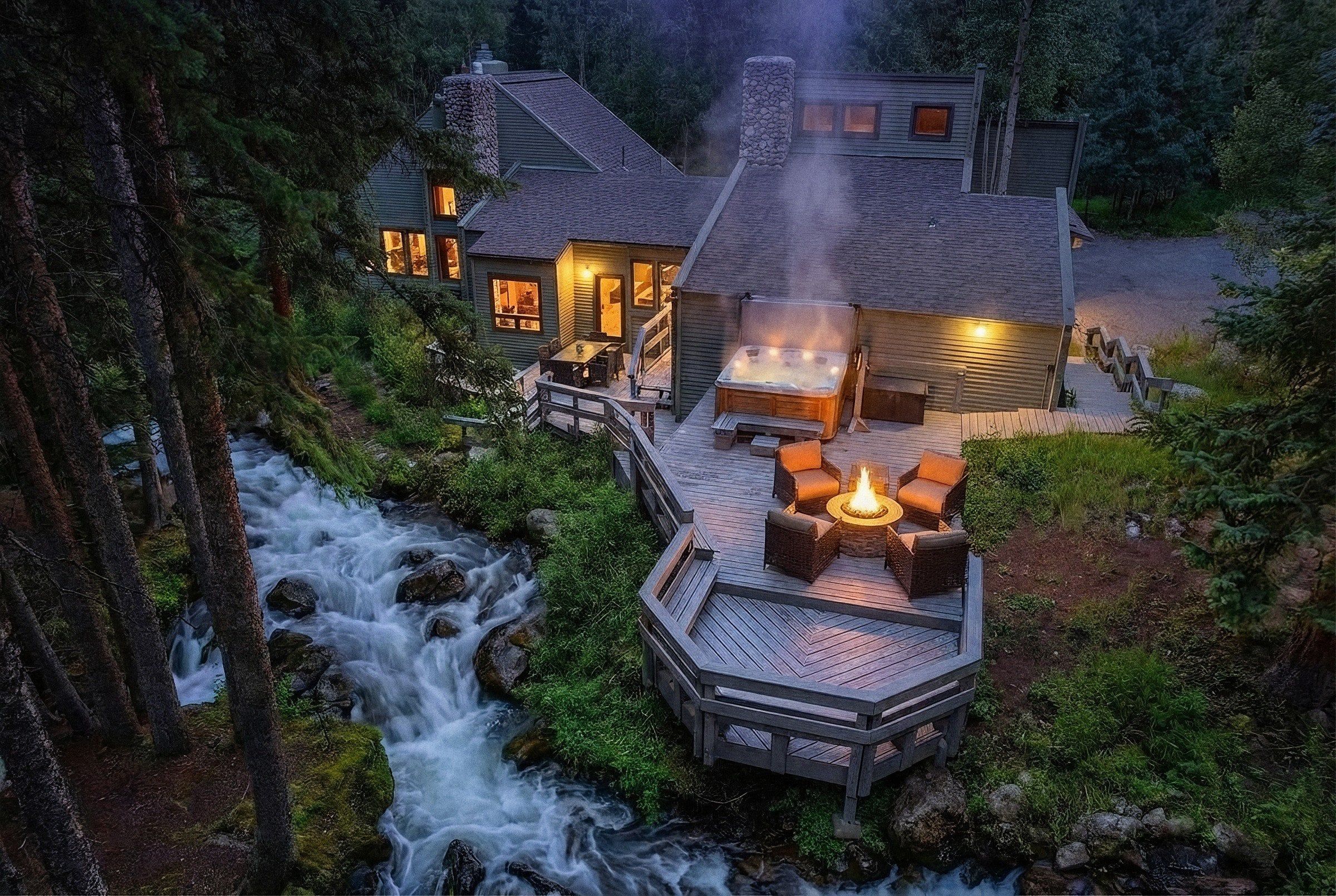 Welcome to Creekside Chateau - Your Own Waterfall Near Breckenridge. A mountain estate on Pennsylvania Creek, with a seven-person hot tub and fire pit on the deck above the water.🔱 💎
