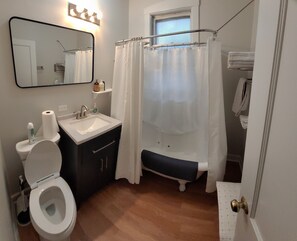 Combined shower/tub, hair dryer, towels, soap
