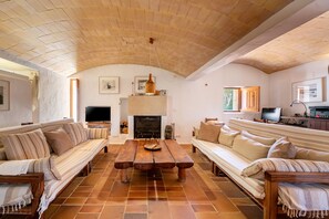 TV, fireplace - Vacation Home "Sa Paret Nova" with Sea View, Private Garden & Wi-Fi (San Francisco Javier)