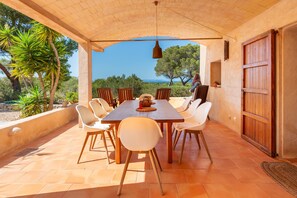 Outdoor dining - Vacation Home "Sa Paret Nova" with Sea View, Private Garden & Wi-Fi (San Francisco Javier)