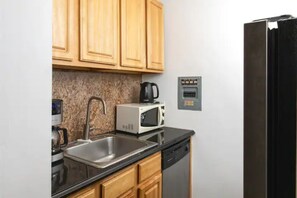 Fridge, microwave, toaster, cookware/dishes/utensils