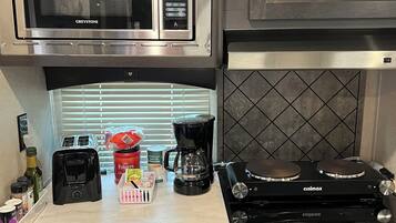 Fridge, microwave, coffee/tea maker, toaster