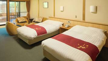 A hotel room with two beds, a chair, a nightstand, and a window with curtains.