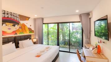 Deluxe Double Room | Premium bedding, desk, laptop workspace, blackout curtains
