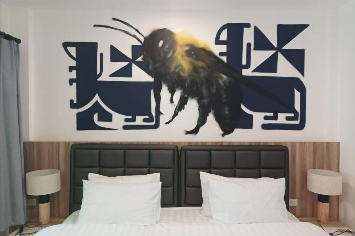 Premium bedding, desk, laptop workspace, blackout curtains
