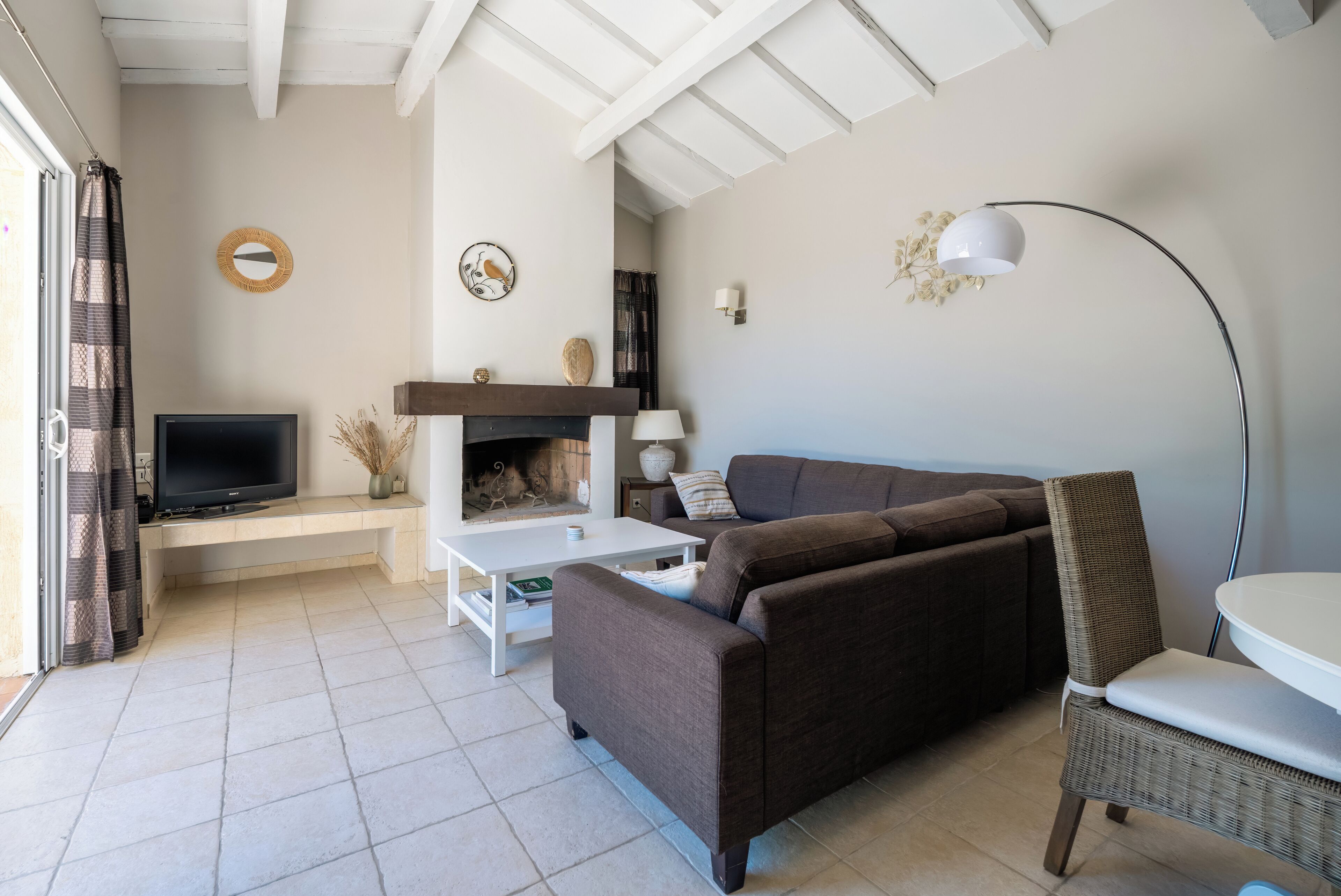 Smart TV, fireplace, books