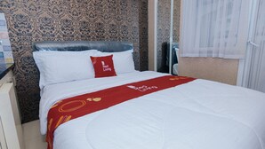 Apartamento City | 1 dormitorio, minibar, wifi gratis y decoración individual
