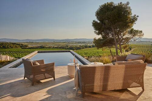 Indoor pool, seasonal outdoor pool, pool umbrellas, pool loungers