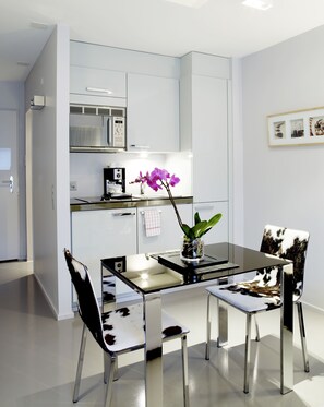 Fridge, microwave, stovetop, coffee/tea maker