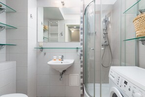 Shower, hair dryer, towels