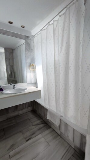 Bathtub, hair dryer