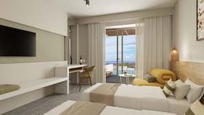 Une chambre d’hôtel moderne dotée d’une télévision à écran plat, d’un bureau avec une chaise, d’un canapé, d’une petite table et offrant une vue sur la mer grâce à de grandes fenêtres.