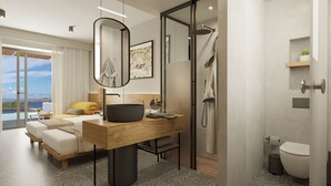 Une salle de bain d’hôtel moderne, dotée d’un grand miroir, d’une douche, de toilettes et d’un lavabo.